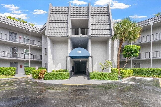 Building Photo - 9091 Lime Bay Blvd Unit 304