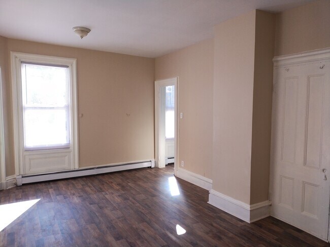 Living room. View of door/hallway to Bedroom #1 - 17 LINDEN St Unit FL2