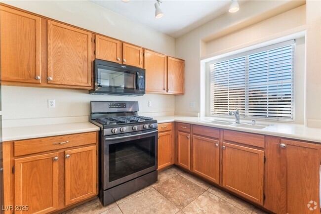 Building Photo - 6809 Squaw Mountain Dr Unit 202 Rental