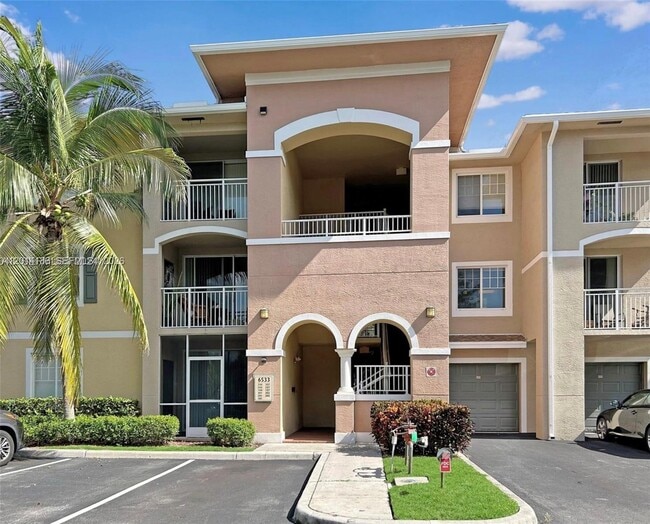 Building Photo - 6533 Emerald Dunes Dr Unit 208