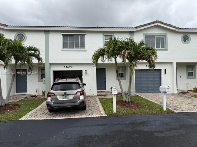 Building Photo - 11627 NW 23rd Ct Unit 11627