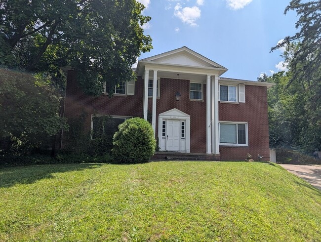 Building Photo - 8983 Highland Dr Unit South