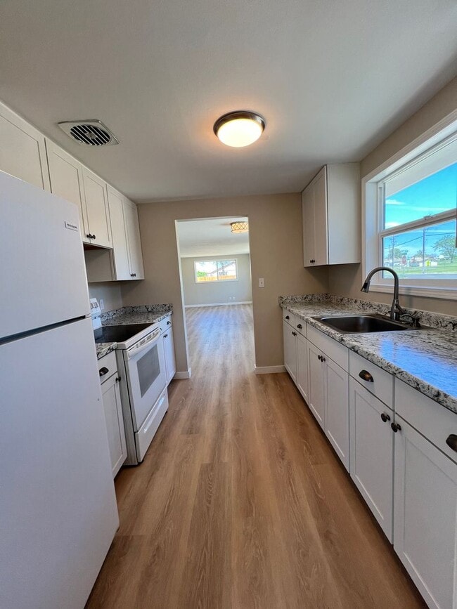 Photo - Single-Family Home with Attached Garage