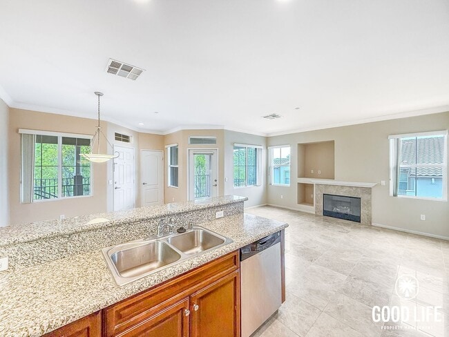 Photo - Bright 2BD/2BA Condo in Sabre Springs with Covered Balcony, In-Unit Laundry & Garage Unit 328