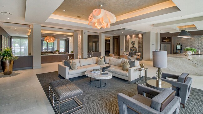 Plush furniture for lounging in the clubhouse - Windsor Oak Hill Apartments