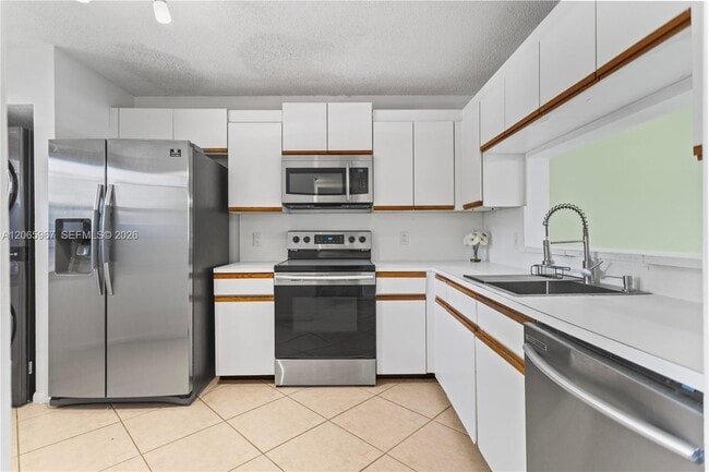 Building Photo - 1100 SW 128th Terrace Unit 210U