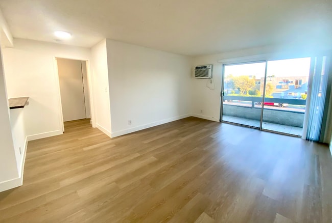 Photo - Stunning 1 Bed/1 Bath Condo Apartment with Private Balcony, Hardwood Flooring, AC, and Spacious L...