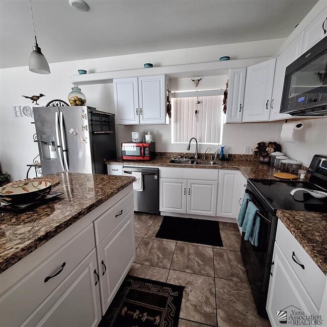 Photo - 12726 E 47th Dr