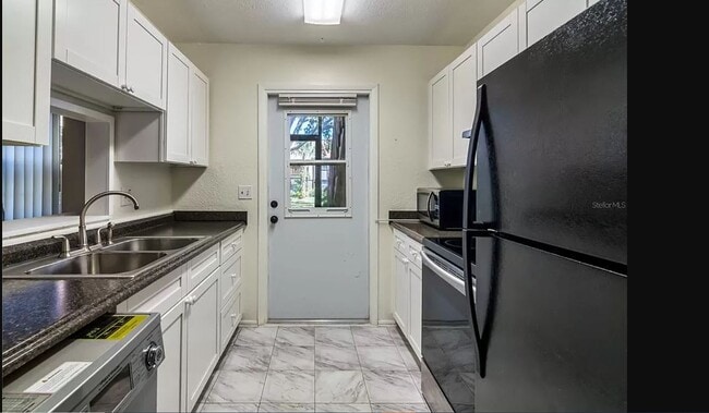 Photo - 5419 Hansel Ave Unit Camelot by the Lake