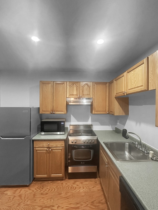 Building Photo - 1001 St Paul St Unit Apt 12a