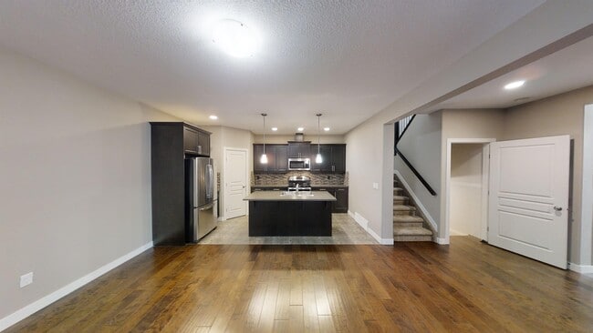 Photo - 10306a-103148 148 Ave