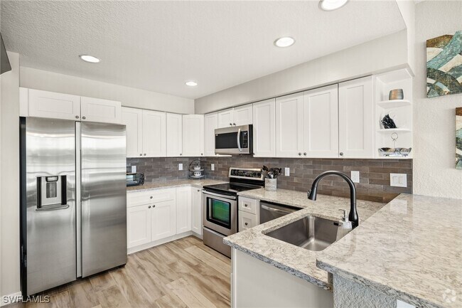 Building Photo - 16269 Coco Hammock Way Unit 101 Rental