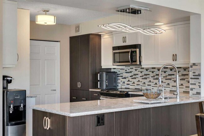 1100 8 Av SW Unité 1906