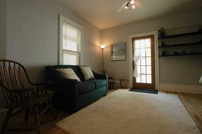 living room with door to back deck - 310 Elmside Boulevard Unit 1