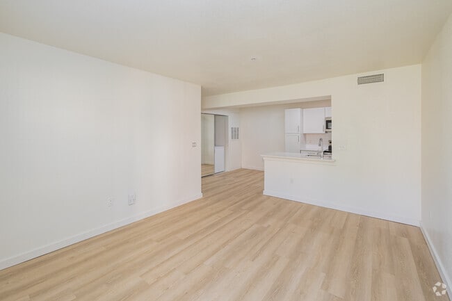 2BR, 1BA - 830SF - Living Room and Dinning Area