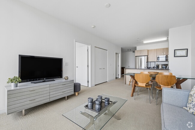 1BR, 1BA - 785SF - Living Room and Kitchen
