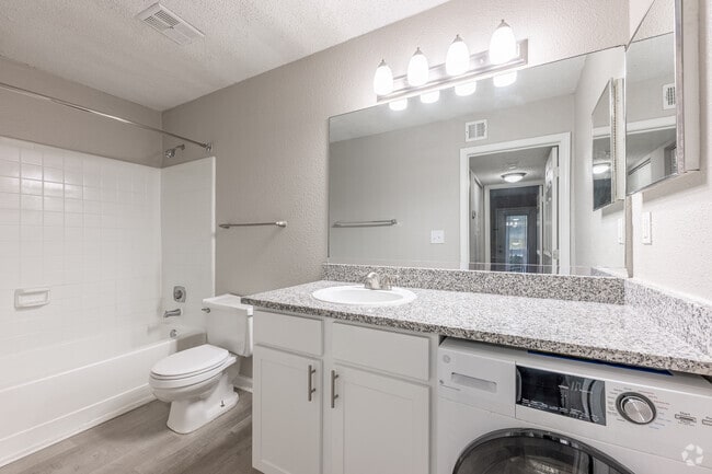 1BR, 1BA - 700SF - A1 - Primary Bathroom/Laundry
