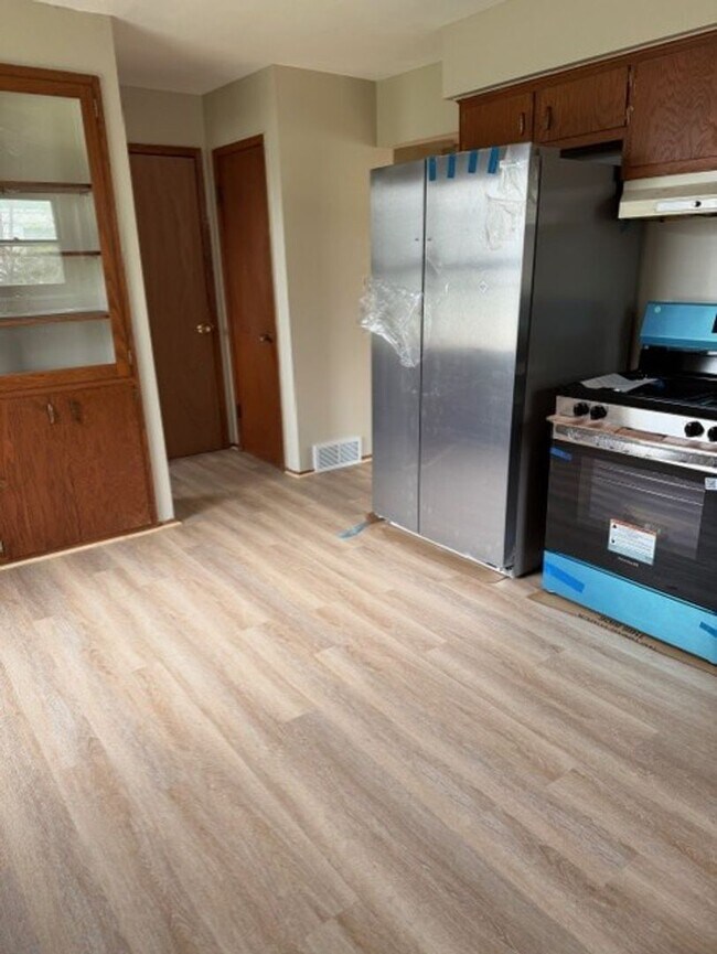 Photo - 7111-13 W Brentwood Ave Unidad 7111 W Brentwood Ave (Left Side)