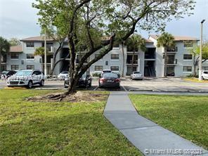 Building Photo - 7195 NW 179th St Unit 109