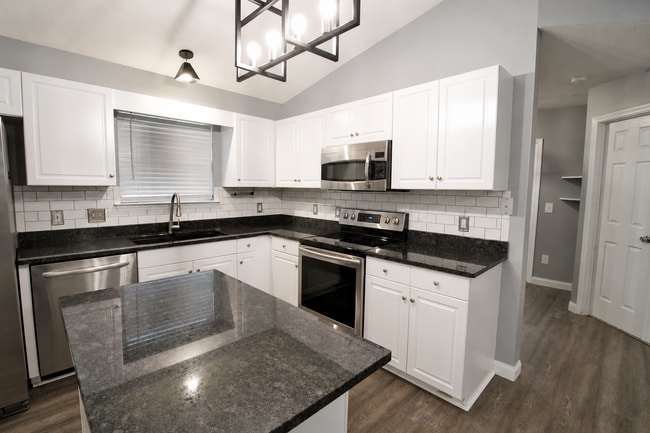 Photo - Updated 3BR/2BA Solar Home with No Carpet, Granite Countertops, Stainless Appliances & Spacious B...