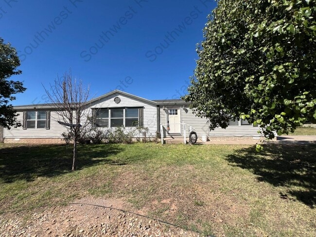 Building Photo - Portales Pet Friendly - 3 Bed 2 Bath!