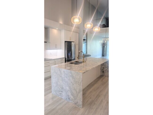 Photo - Elegant, Fully Renovated Townhome in Gated Grand Haven Community!