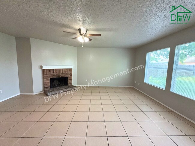 Photo - Spacious 4-Bedroom Home with Fireplace & Large Backyard in SW Fort Worth