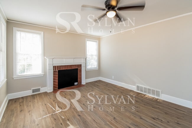 Photo - The living is easy in this 3 bedroom, 2 bathroom brick home