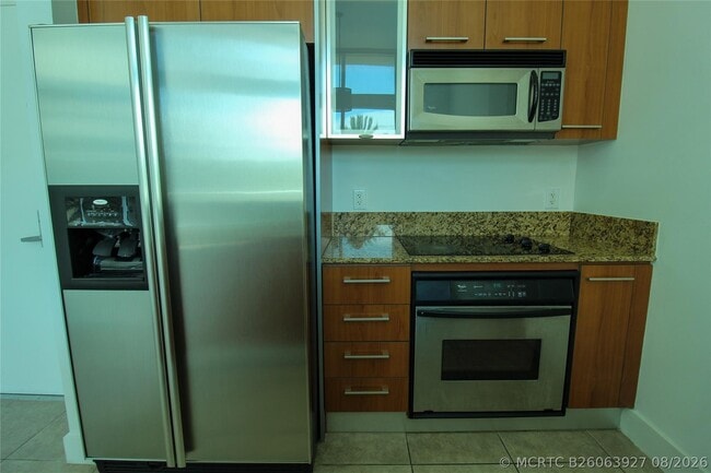 Building Photo - 9055 SW 73rd Ct Unit 309
