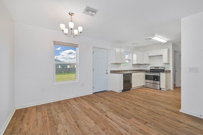 Photo - 3BR/2.5BA Cape Coral Home w/ 2-Car Garage & Spacious Yard – Available Now!