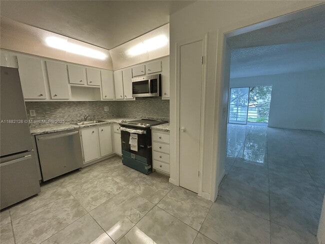 Building Photo - 2061 NW 47th Terrace Unit 212