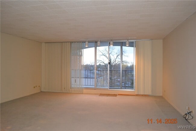 Building Photo - 5854 Main St Unit 301