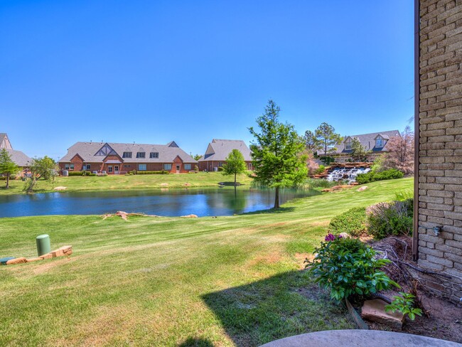 Building Photo - Luxury Edmond Townhome Overlooking Waterfa...