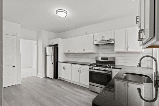 Photo - Spacious 1 Bedroom Apartment with Den - In Unit Laundry!