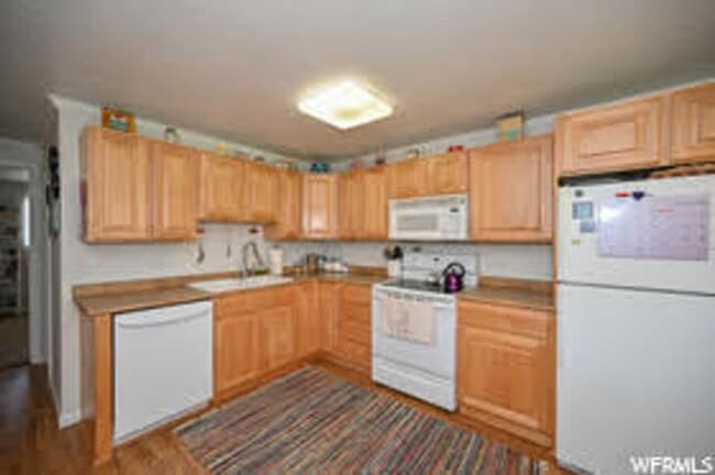 Photo - Charming 2 Bed 1 Bath Millcreek Apartment in Prime Location Unit B