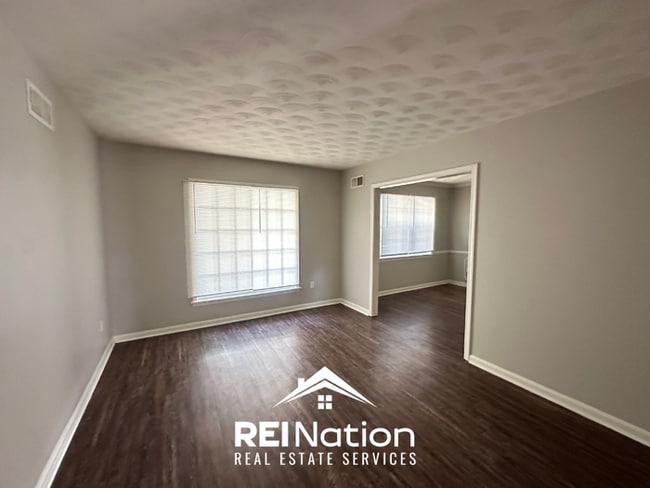 Photo - Spacious 4BR/2BA Memphis Rental with 2-Car Garage, Hardwood Floors & Fireplace