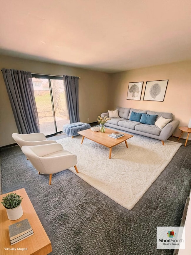 Building Photo - Updated 2 bed 1 bath main floor apartment with covered detached garage