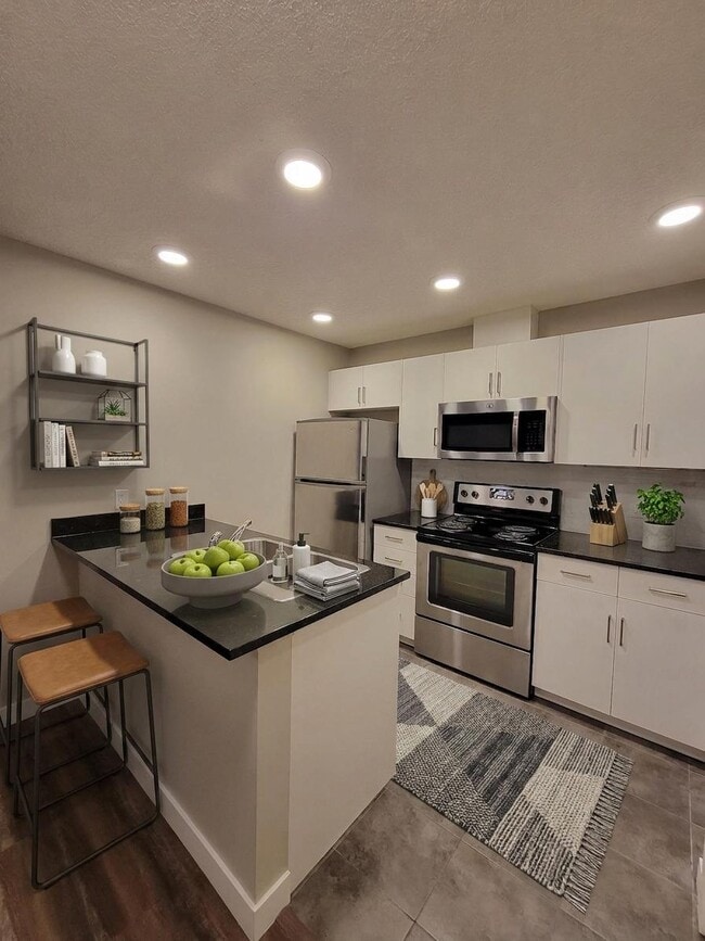 Building Photo - 16315 96A Av NW Unit 105C