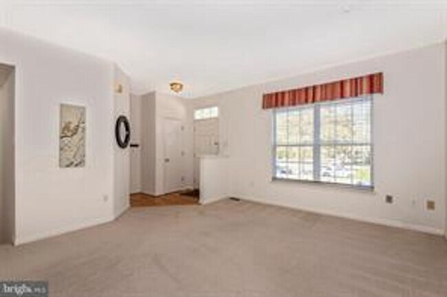 Photo - WELL MAINTAINED TOWNHOUSE WITH ONE CAR GARAGE, DECK,
