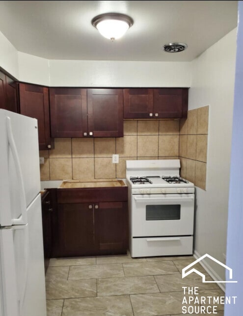 Building Photo - 1515 W Morse Ave Unit 211 Rental