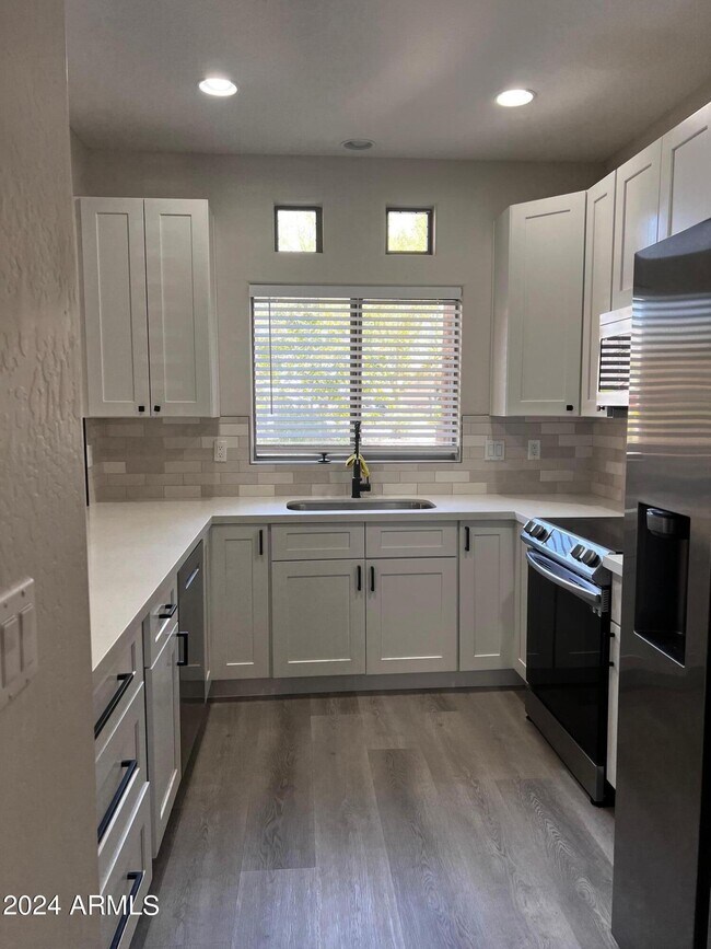 Photo - 9100 E Raintree Dr Unit 131