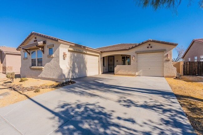 Building Photo - Four Bedrooms, 3 Car Garage - New flooring!