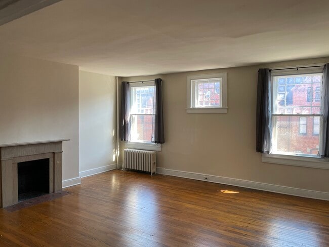 Building Photo - 1024 N Calvert St Unit #3