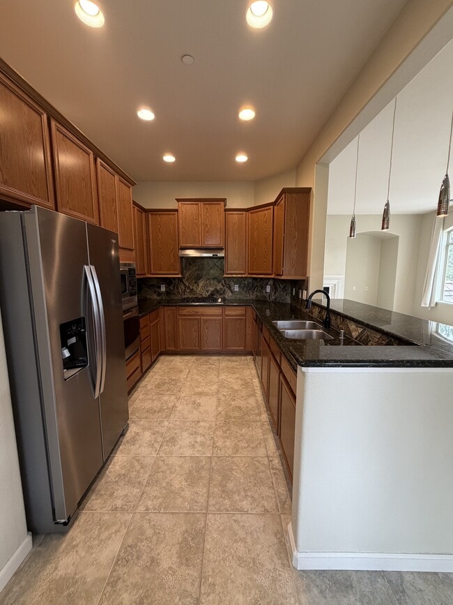 Photo - 9900 Wilbur May Pkwy