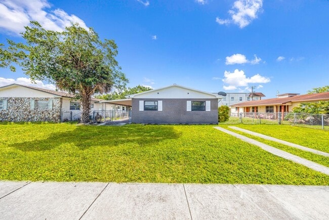 Building Photo - 6172 SW 44th St Unit 1