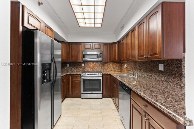 Building Photo - 3600 Mystic Pointe Dr Unit 310
