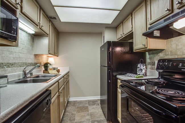 Custom wood cabinetry and tile backsplashes - The Bordeaux