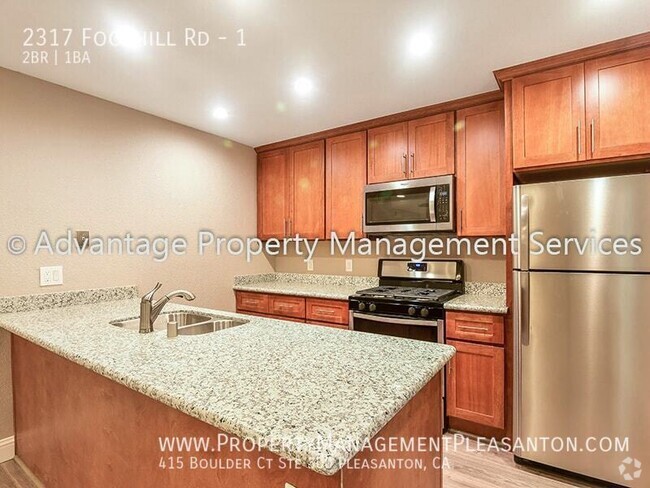 Building Photo - Updated 2 Bed, 1 Bath, 798 sq. ft. Condo l... Unit 1