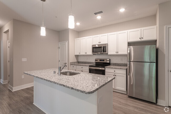 3 BR, 2 BA - 1456SF - Kitchen - Windward on the River