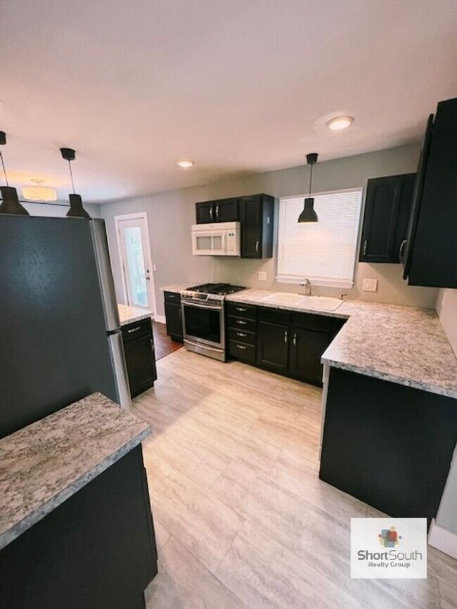 Photo - Updated - 3 bed 1.5 bath, with a detached garage